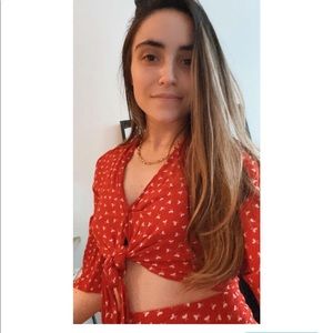 Skirt has slit at side. Mid leg.